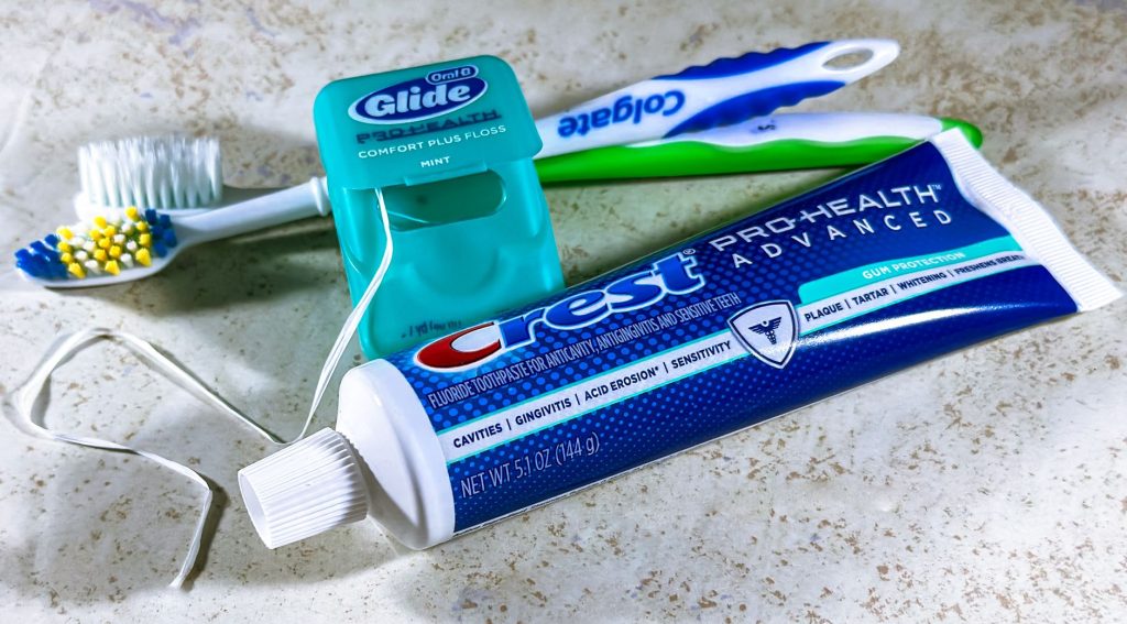 Close-up of dental care items including toothbrush, floss, and toothpaste for oral hygiene. — Future-Proof Your Healthcare wi