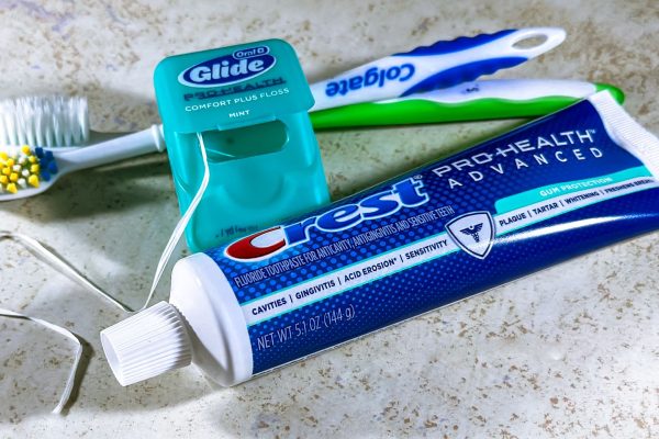 Close-up of dental care items including toothbrush, floss, and toothpaste for oral hygiene. — Future-Proof Your Healthcare wi